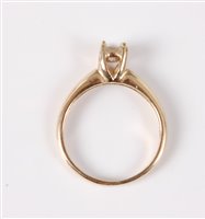 Lot 407 - A 9ct diamond solitaire ring, the round...