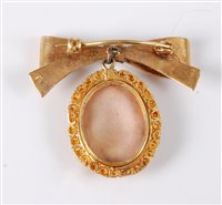 Lot 430 - A 9ct bow brooch and filigree pendant, the 9ct...