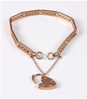 Lot 438 - A 9ct fancy link bracelet, with heart shaped...