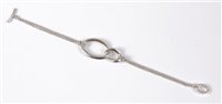 Lot 444 - A silver bracelet by Links of London, the two...
