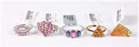Lot 456 - Four 9ct rings and a 9ct pendant, to include a...