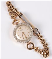 Lot 301 - A lady's 18ct and diamond cased Recta...