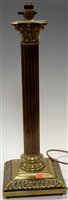 Lot 5 - A large brass table lamp having a Corinthian...