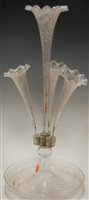 Lot 6 - A Victorian clear glass table epergne having...