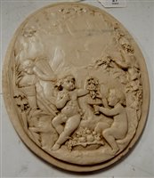 Lot 27 - A marble plaque relief decorated with...
