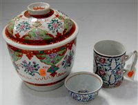 Lot 32 - A 19th century Chinese stoneware tankard...