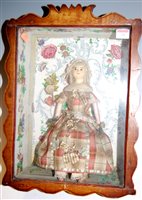 Lot 34 - A 19th century wax head doll having beaded...