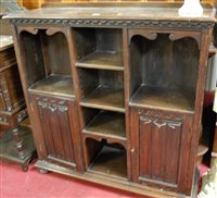 Lot 1136 - An early 20th century ledgeback oak bookshelf,...