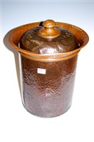 Lot 93 - An Arts & Crafts hammered copper coal bin the...