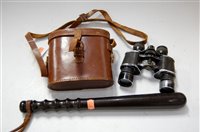 Lot 100 - A turned lignum vitae truncheon impressed with...