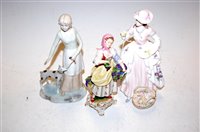 Lot 214 - A Coalport figurine of the Flower seller, a...