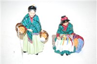 Lot 228 - Two Royal Doulton figures; The Orange Lady...