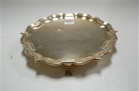 Lot 255 - A George V silver salver, having raised...