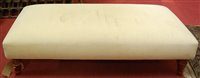 Lot 1363 - A contemporary upholstered long low footstool,...