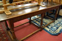 Lot 1366 - An antique joined oak planked top narrow...