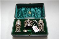 Lot 272 - An Edwardian silver three piece cruet to...