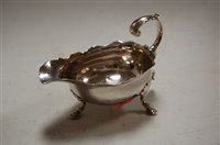 Lot 275 - A 19th century silver sauce boat having a wavy...