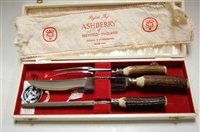 Lot 280 - A mid 20th century three piece carving set...