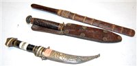 Lot 320 - A British Commando fighting knife having a...