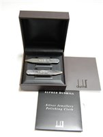 Lot 482 - A cased pair of Dunhill silver shirt collar...