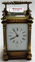 Lot 338 - An early 20th century French lacquered brass...