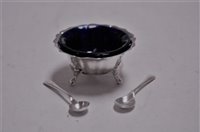 Lot 341 - A George V silver open salt, having blue glass...