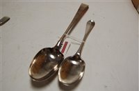Lot 346 - A George III silver stuffing spoon; together...
