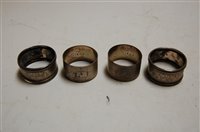 Lot 374 - A pair of George V silver napkin rings, having...