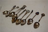 Lot 396 - A small collection of assorted silver spoons,...