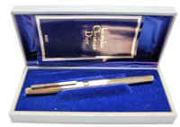 Lot 527 - A Christian Dior silver gilt cased fountain...
