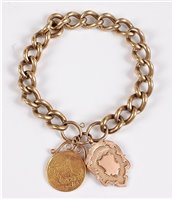 Lot 1176 - A 9ct charm bracelet, the 9ct curblink charm...