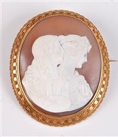 Lot 1206 - *A late 19th century cameo brooch, the oval...