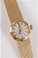 Lot 1221 - A lady's 18ct Omega Ladymatic wristwatch, the...