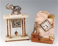 Lot 189 - A French Art Deco onyx and marble inset...