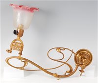Lot 224 - An Art Nouveau brass single wall light, of...