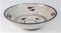 Lot 77 - A large studio pottery glazed circular table...