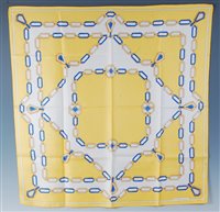 Lot 169 - A Must de Cartier of Paris silk scarf, having...