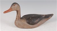 Lot 215 - An early 20th century painted wood decoy duck,...