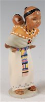 Lot 70 - A Lenci Art Deco pottery figure of a North...