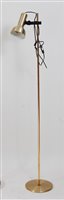 Lot 433 - A 1970s gilt brass and brushed aluminium floor...