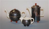 Lot 13 - A German porcelain three-piece tea service,...
