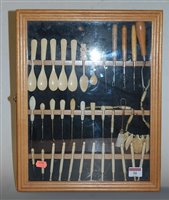 Lot 30 - A collection of bone spoons, lace bobbins,...