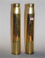 Lot 55 - A pair of WWII brass shell cases each dated...