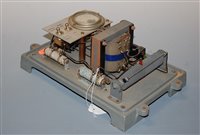Lot 59 - A trickle charge unit for an electric clock