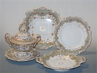 Lot 66 - A 19th century Rockingham style part dinner...