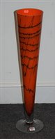 Lot 104 - A large studio amber glass table vase of...