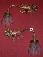 Lot 107 - A pair of Art Nouveau style lacquered brass...