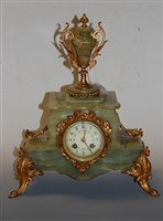 Lot 110 - A 19th century onyx cased and gilt metal...