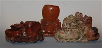 Lot 132 - A Chinese soapstone sculpture carved as...