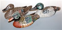 Lot 158 - Three various painted wooden figures of ducks